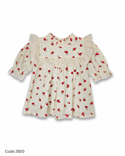Cream girl dress with floral prints, long elastic sleeves, frill details, and pleated neckline