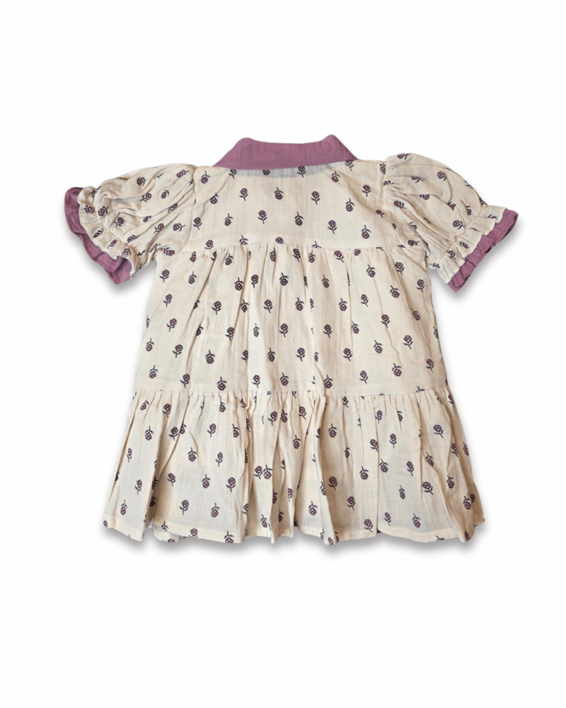 Floral printed girl dress with purple collar, front button closure, and short elastic sleeves