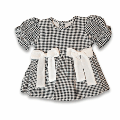 Black and white check girl dress with white bow and back button closure