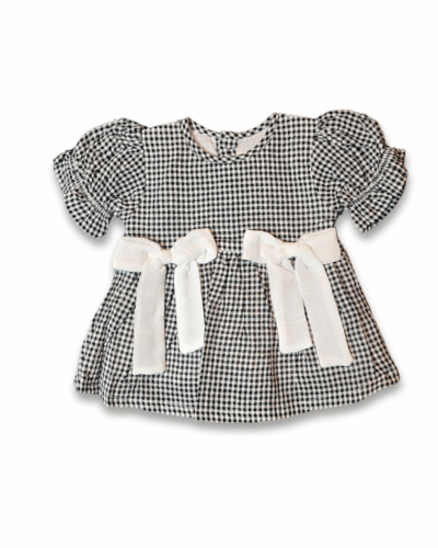 Black and white check girl dress with white bow and back button closure