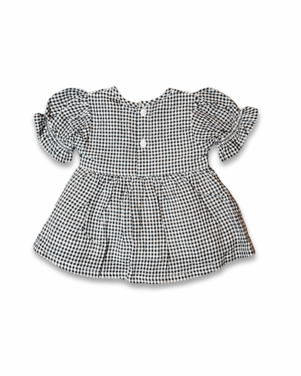 Black and white check girl dress with white bow and back button closure