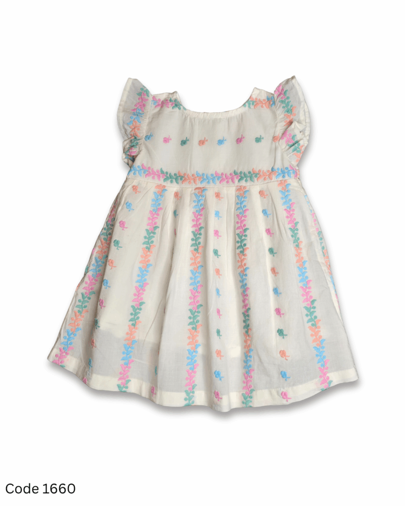 White sleeveless girl dress with flutter sleeves, full embroidery, soft inner lining, and back zip closure